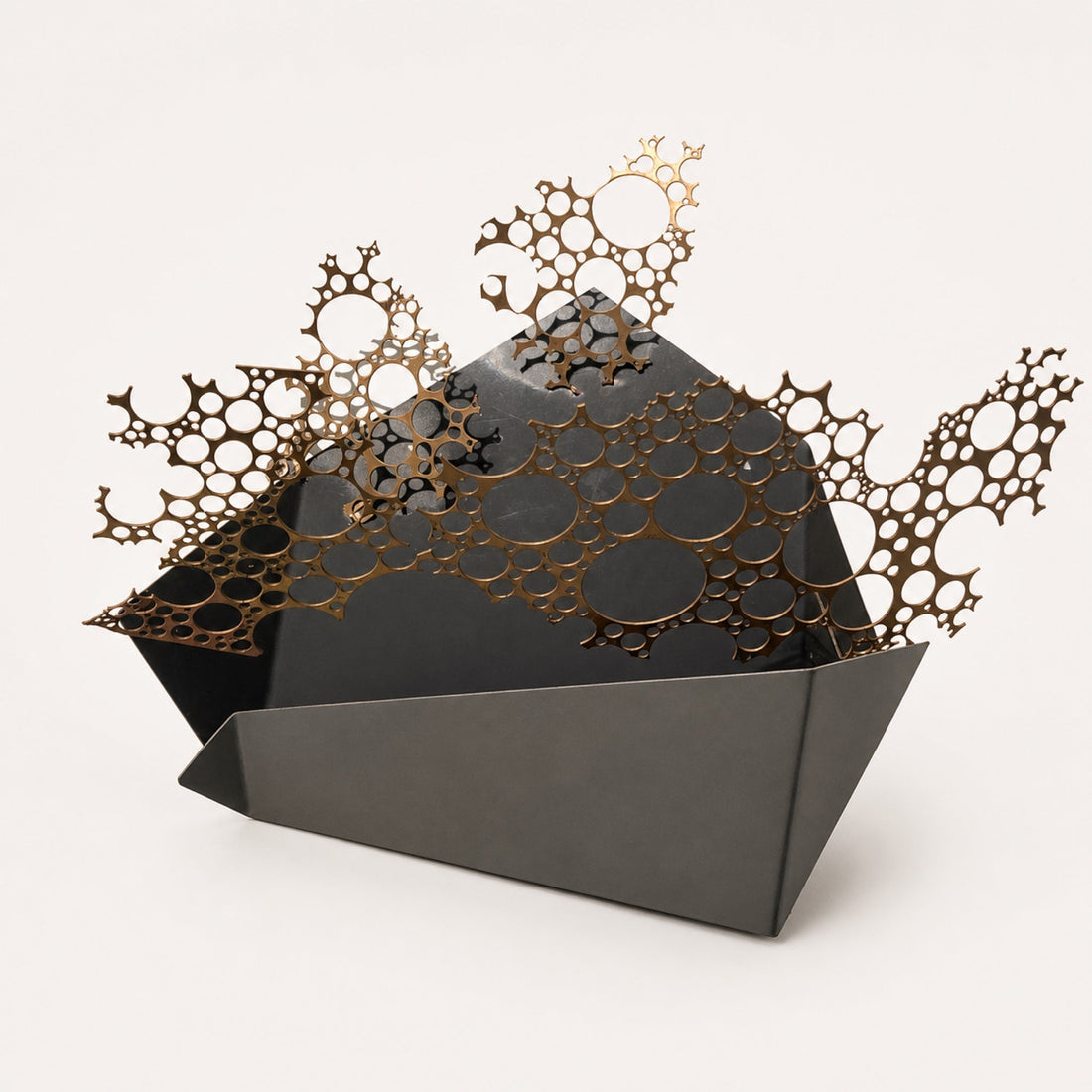 Catalog illustration of decorative laser-cut metalwork with a coral-like pattern