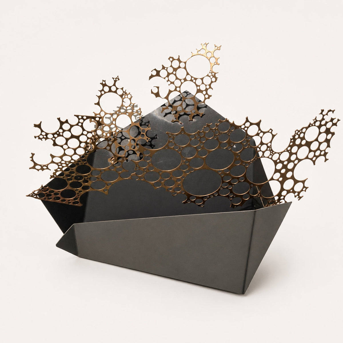 Catalog illustration of decorative laser-cut metalwork with a coral-like pattern