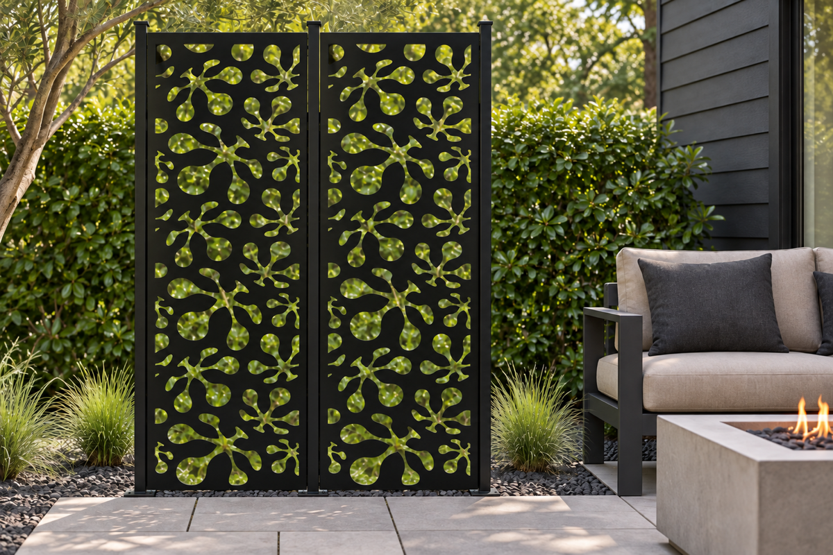 Design 255 Starburst Pebble Scatter Laser Cut Metal Privacy Screen Panel installed garden daylight view