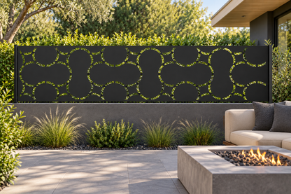 Design 307 Pebble Link Border Laser Cut Metal Privacy Screen Panel installed garden daylight view