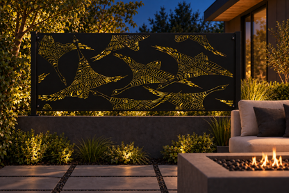 Design 348 Swimming Koi Border Laser Cut Metal Privacy Screen Panel installed garden night lighting view
