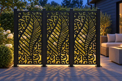 Design 411 Feather and Cloud Laser Cut Metal Privacy Screen Panel installed garden night lighting view