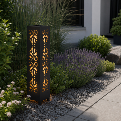 Design 001 laser cut garden light pillar installed in landscaped patio during daytime
