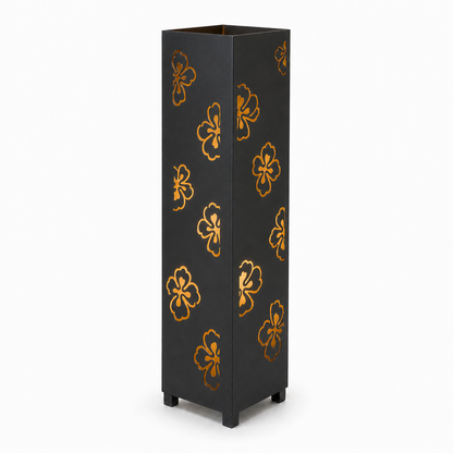 Design 003 black laser cut metal garden light tower with warm LED glow on white background