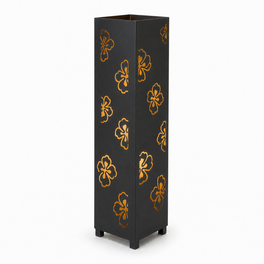 Design 003 black laser cut metal garden light tower with warm LED glow on white background