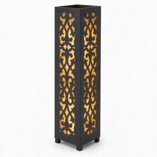Design 006 black laser cut metal garden light tower with warm LED glow on white background