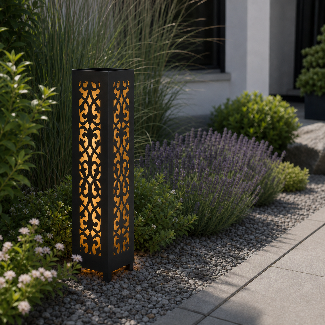 Design 006 laser cut garden light pillar installed in landscaped patio during daytime