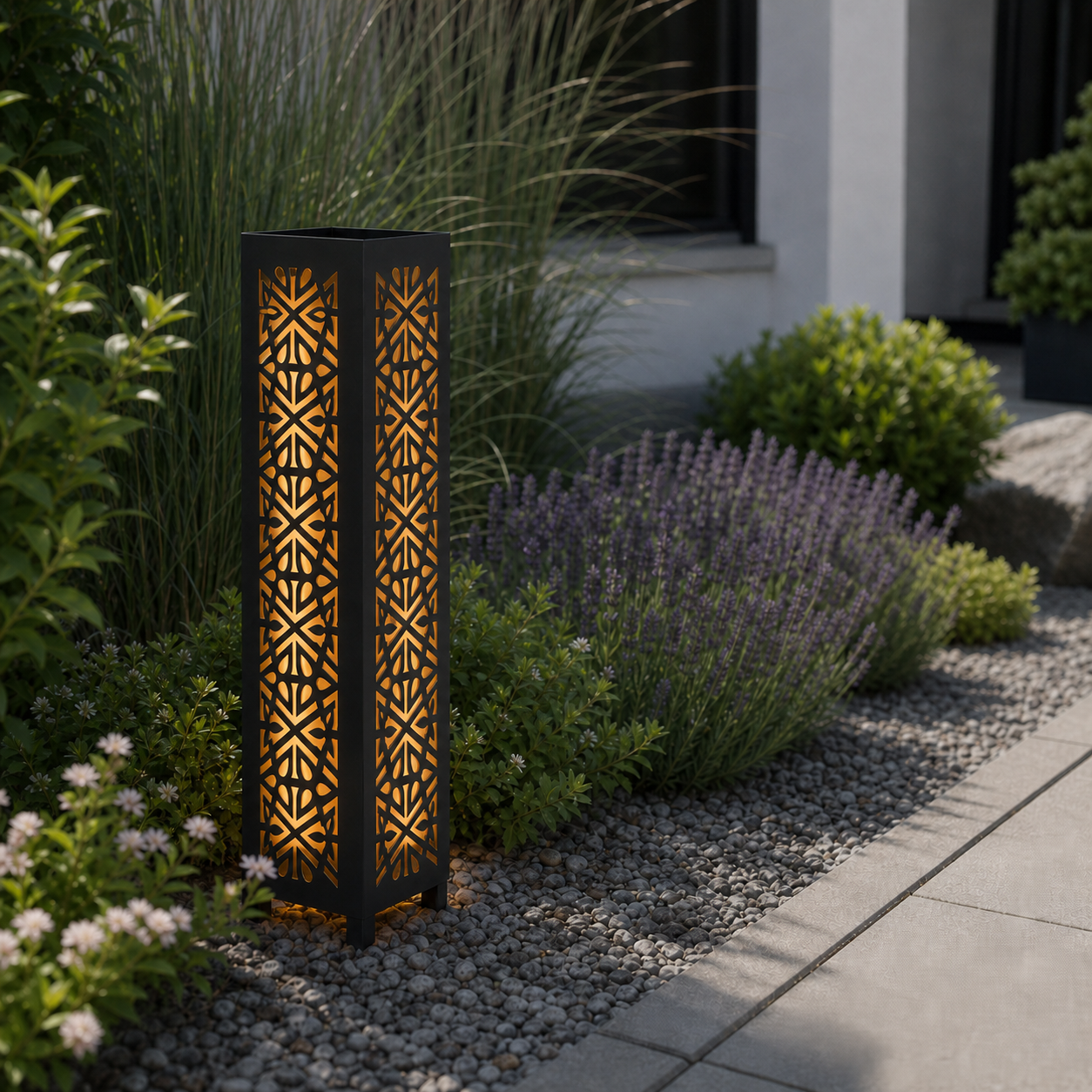 Design 007 laser cut garden light pillar installed in landscaped patio during daytime