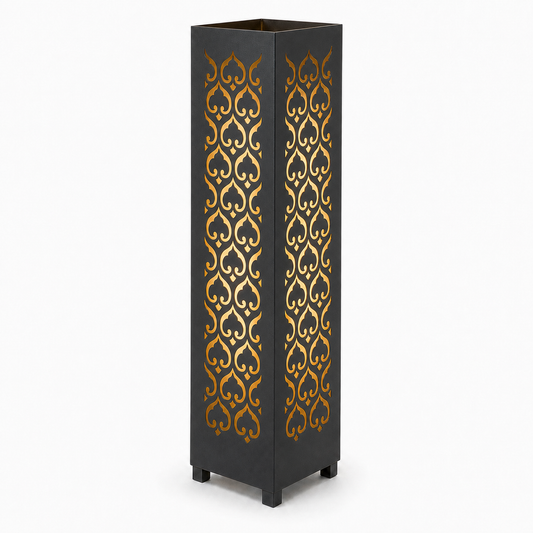 Design 009 black laser cut metal garden light tower with warm LED glow on white background