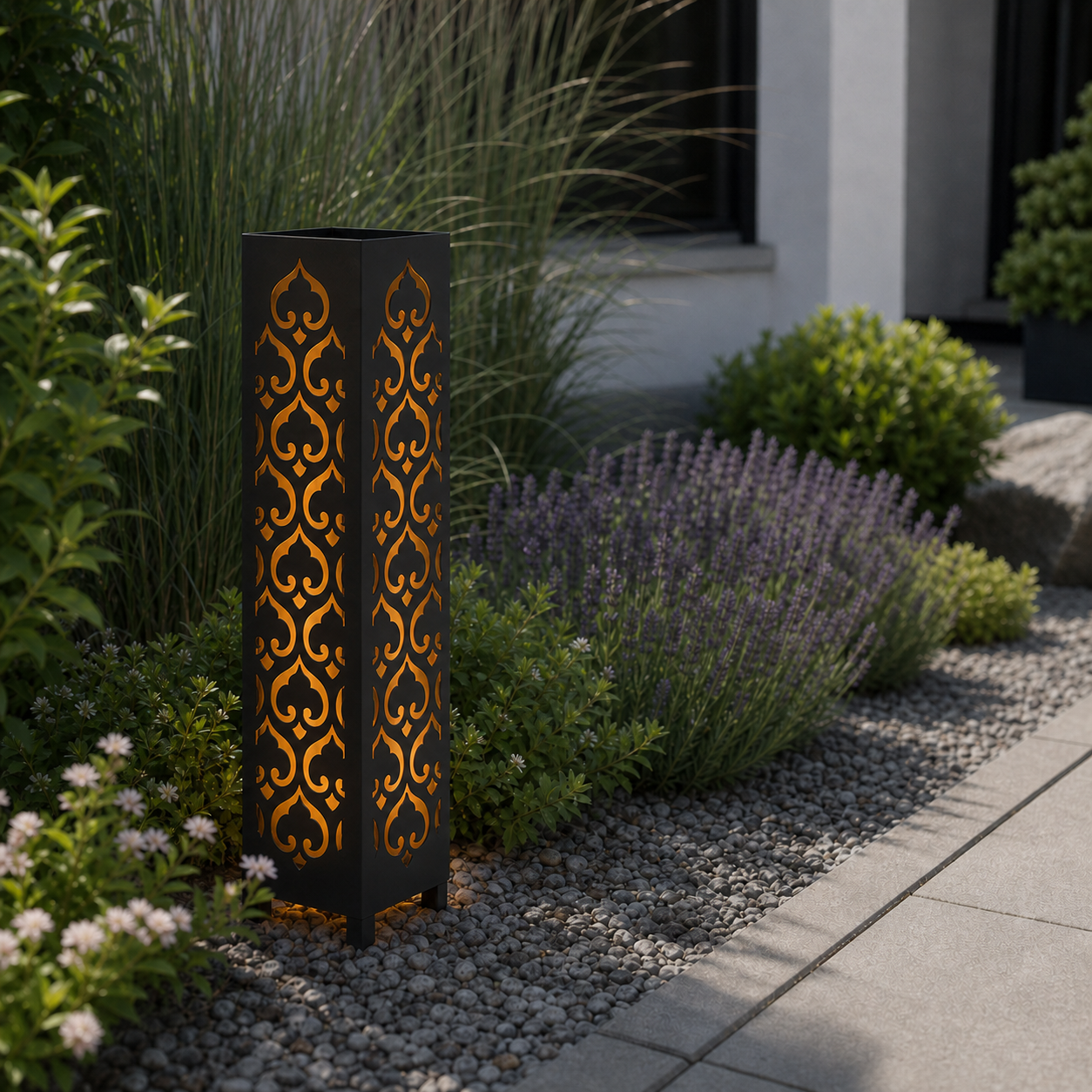 Design 009 laser cut garden light pillar installed in landscaped patio during daytime