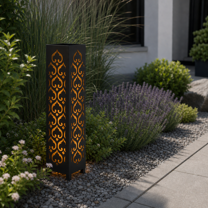 Design 009 laser cut garden light pillar installed in landscaped patio during daytime