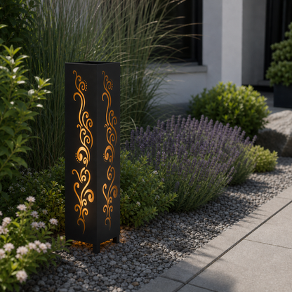 Design 010 laser cut garden light pillar installed in landscaped patio during daytime