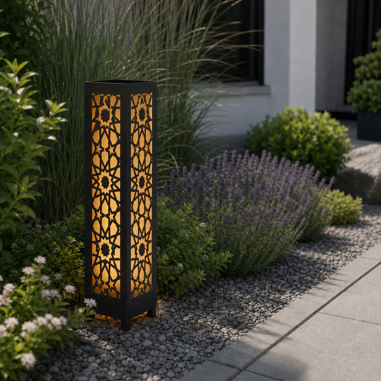 Design 016 laser cut garden light pillar installed in landscaped patio during daytime