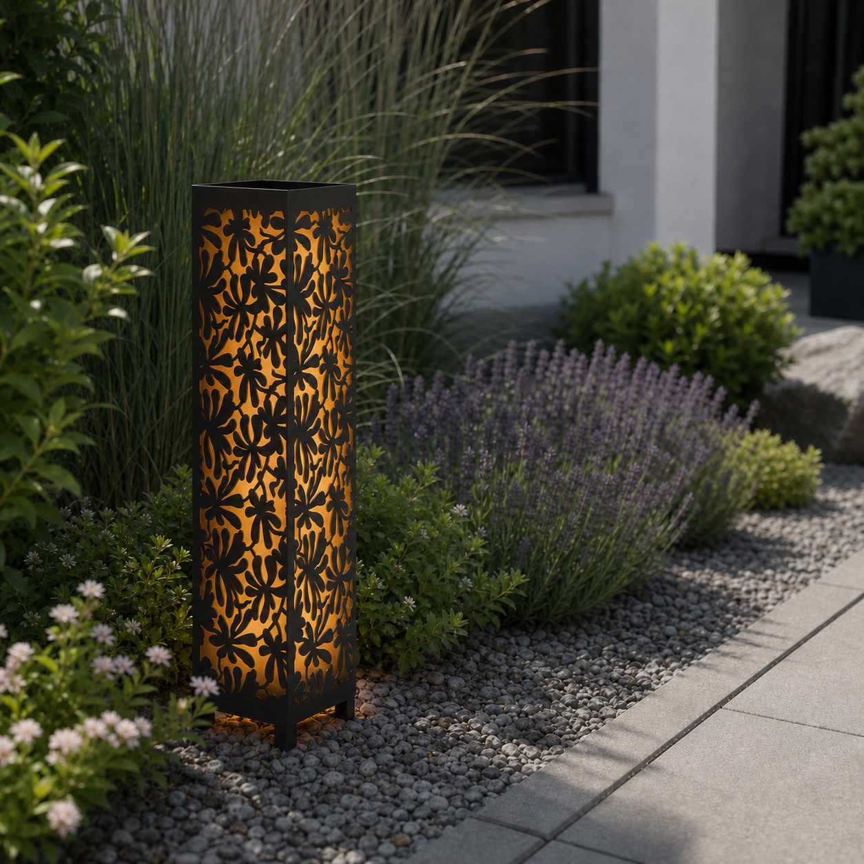 Design 023 laser cut garden light pillar installed in landscaped patio during daytime