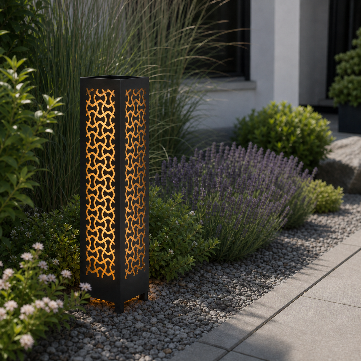 Design 025 laser cut garden light pillar installed in landscaped patio during daytime