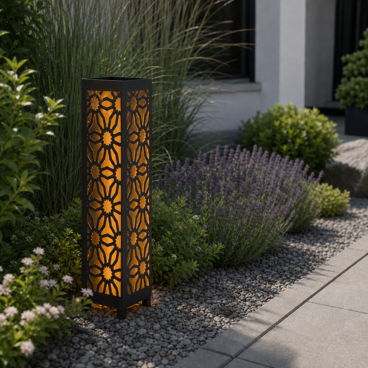 Design 027 laser cut garden light pillar installed in landscaped patio during daytime