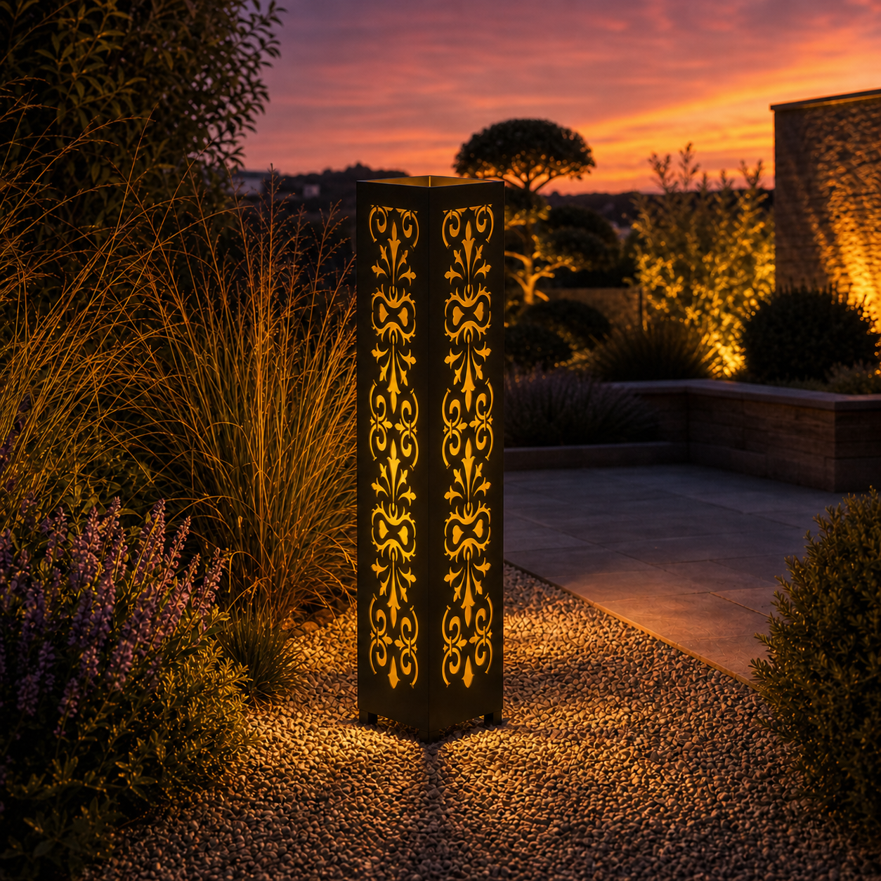 Design 034 outdoor decorative LED light column glowing at dusk in garden setting