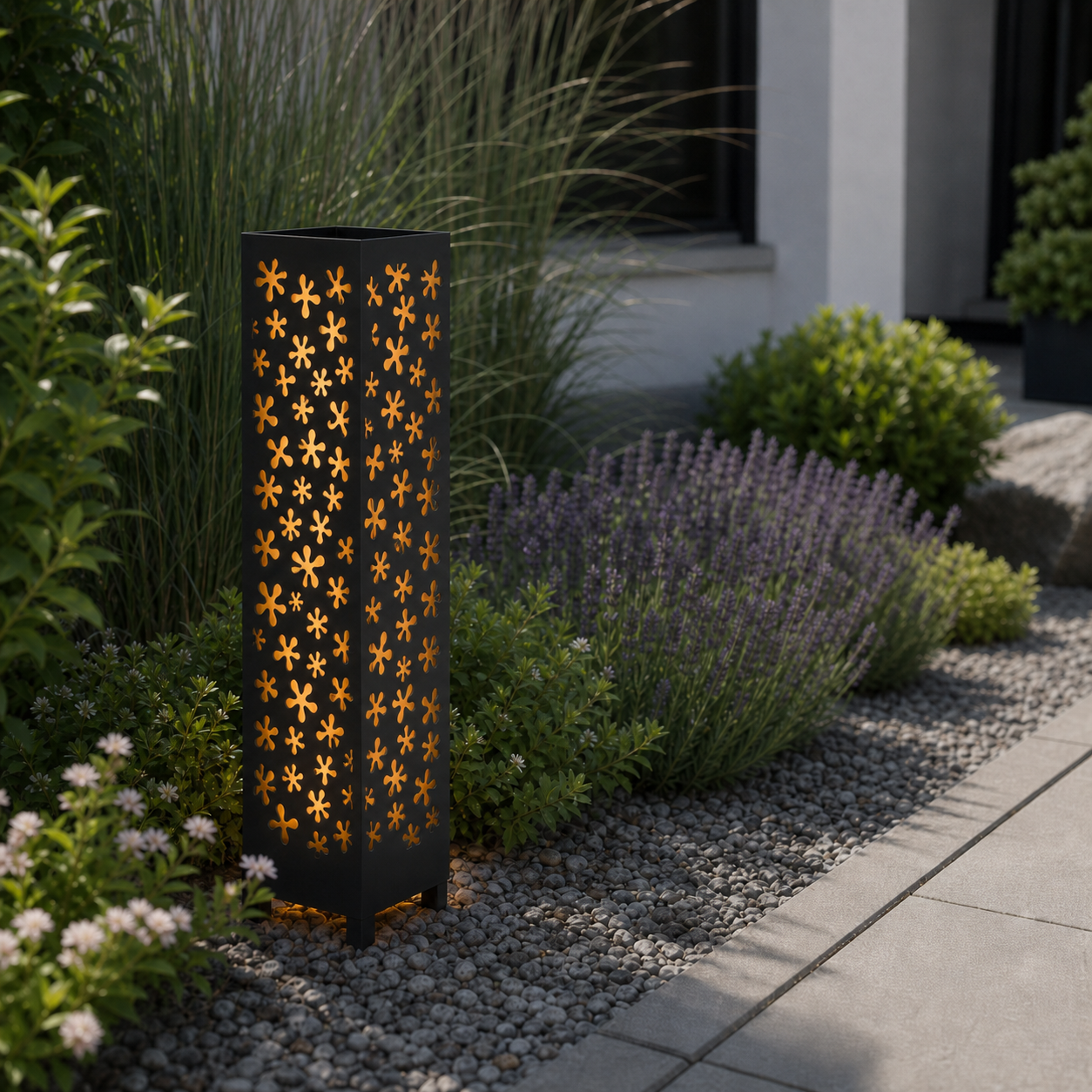Design 046 laser cut garden light pillar installed in landscaped patio during daytime