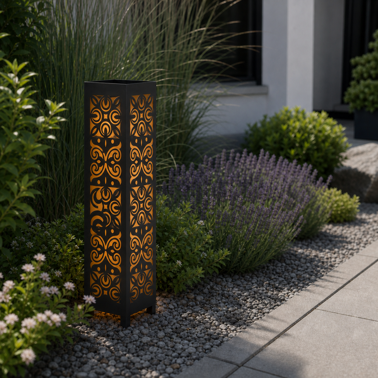 Design 047 laser cut garden light pillar installed in landscaped patio during daytime