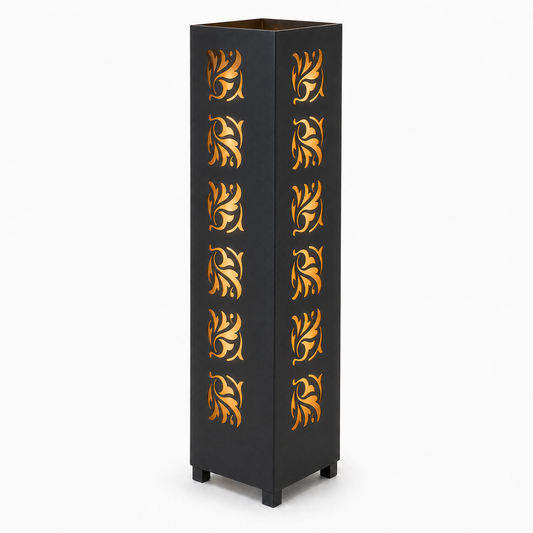 Design 050 black laser cut metal garden light tower with warm LED glow on white background