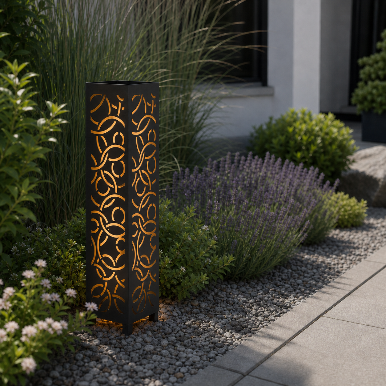 Design 055 laser cut garden light pillar installed in landscaped patio during daytime