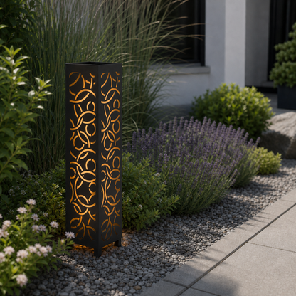 Design 055 laser cut garden light pillar installed in landscaped patio during daytime