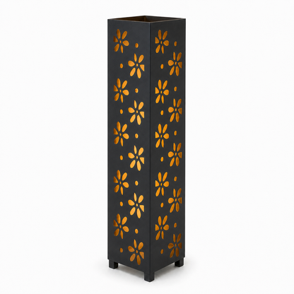 Design 056 black laser cut metal garden light tower with warm LED glow on white background