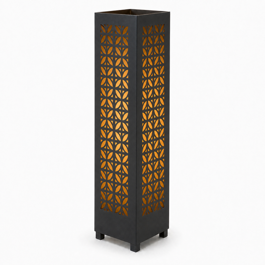 Design 060 black laser cut metal garden light tower with warm LED glow on white background