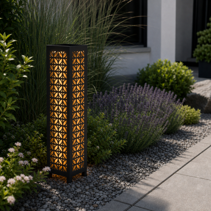 Design 060 laser cut garden light pillar installed in landscaped patio during daytime