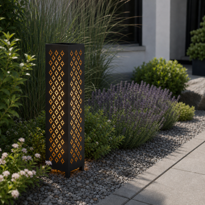 Design 063 laser cut garden light pillar installed in landscaped patio during daytime
