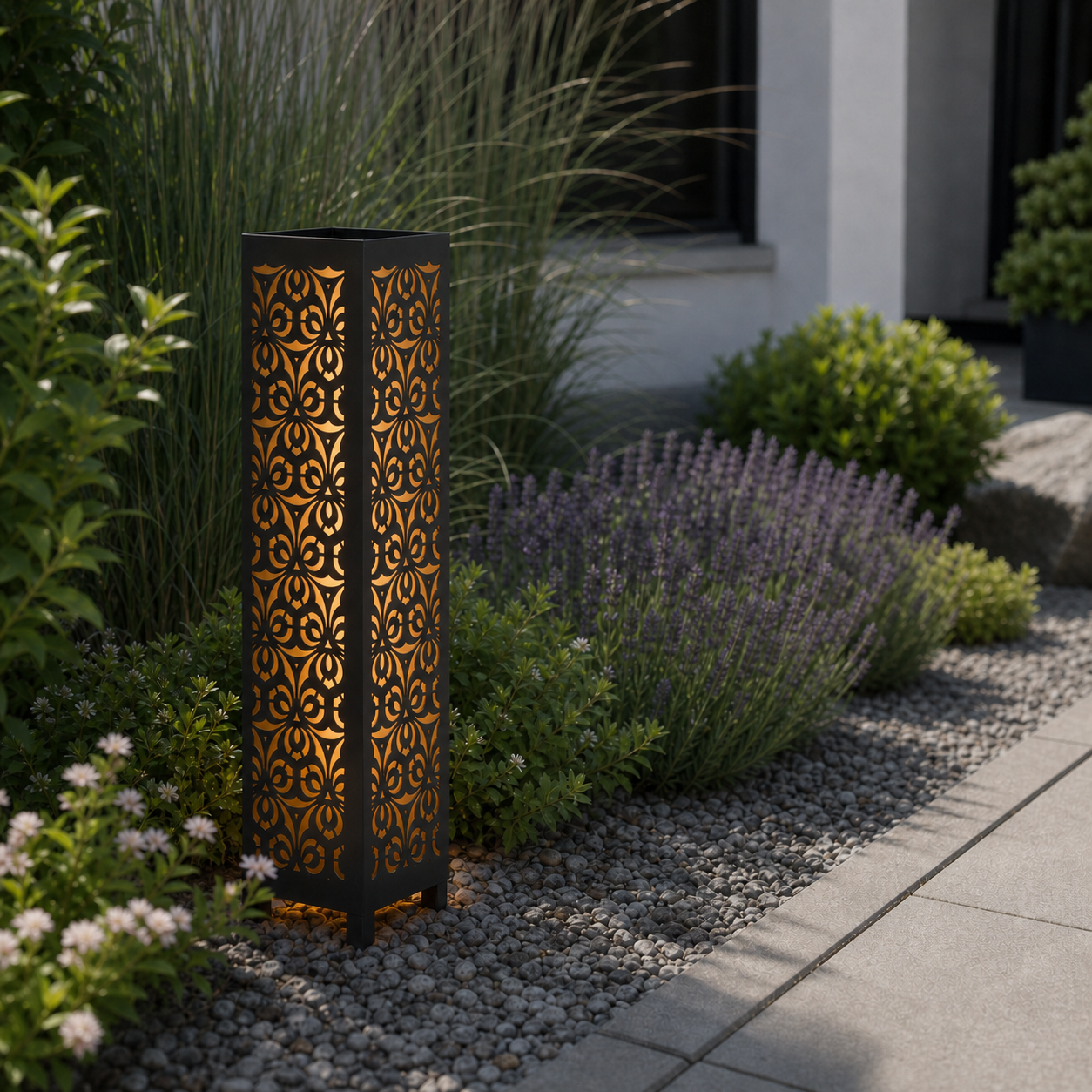 Design 064 laser cut garden light pillar installed in landscaped patio during daytime