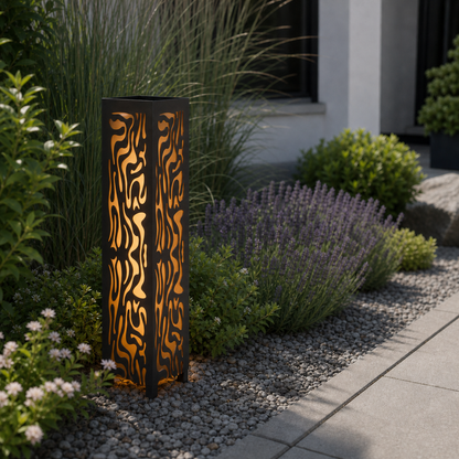 Design 065 laser cut garden light pillar installed in landscaped patio during daytime