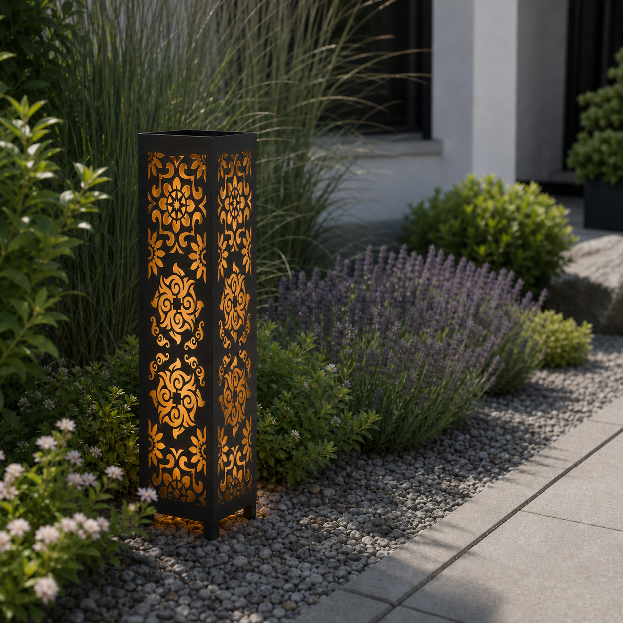 Design 093 laser cut garden light pillar installed in landscaped patio during daytime