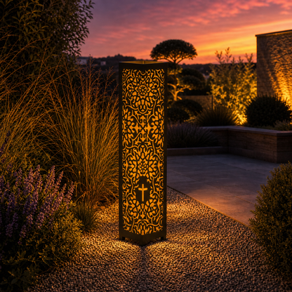 Design 094 outdoor decorative LED light column glowing at dusk in garden setting