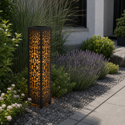 Design 095 laser cut garden light pillar installed in landscaped patio during daytime