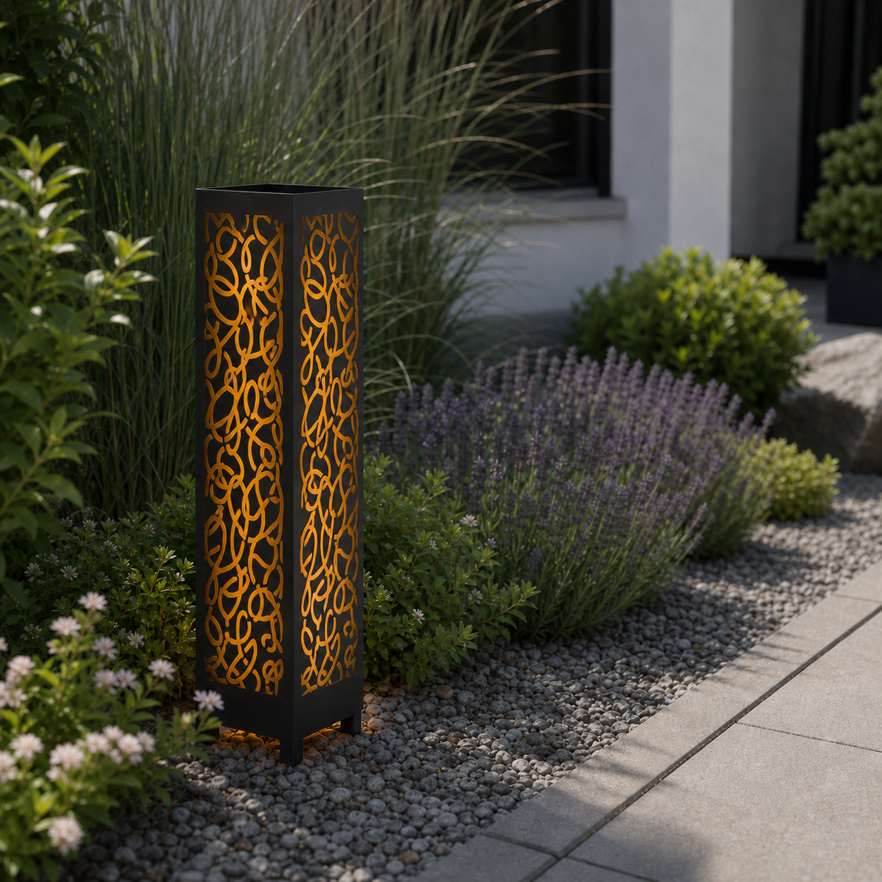 Design 102 laser cut garden light pillar installed in landscaped patio during daytime