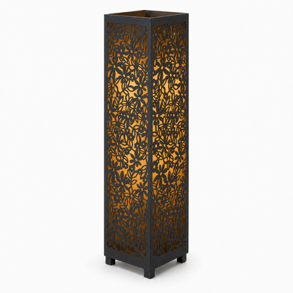 Design 103 black laser cut metal garden light tower with warm LED glow on white background