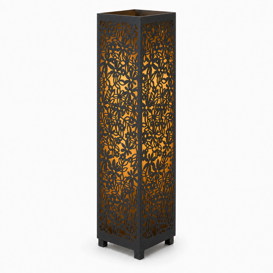 Design 103 black laser cut metal garden light tower with warm LED glow on white background