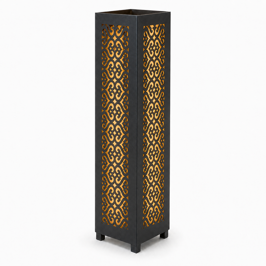 Design 104 black laser cut metal garden light tower with warm LED glow on white background