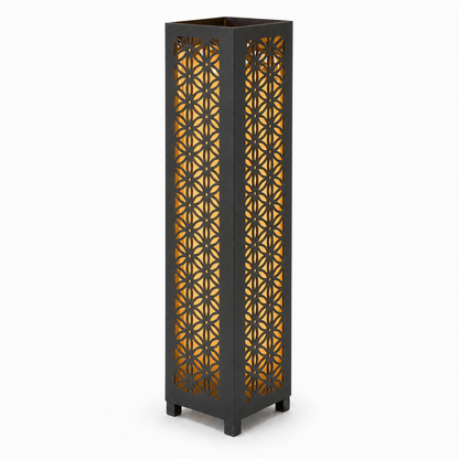Design 106 black laser cut metal garden light tower with warm LED glow on white background