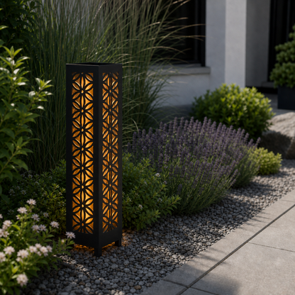 Design 106 laser cut garden light pillar installed in landscaped patio during daytime