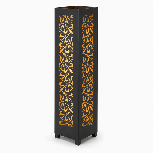 Design 108 black laser cut metal garden light tower with warm LED glow on white background