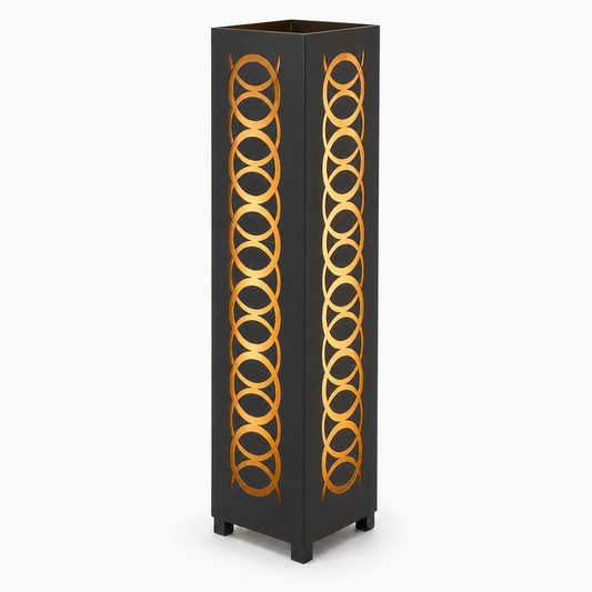 Design 109 black laser cut metal garden light tower with warm LED glow on white background