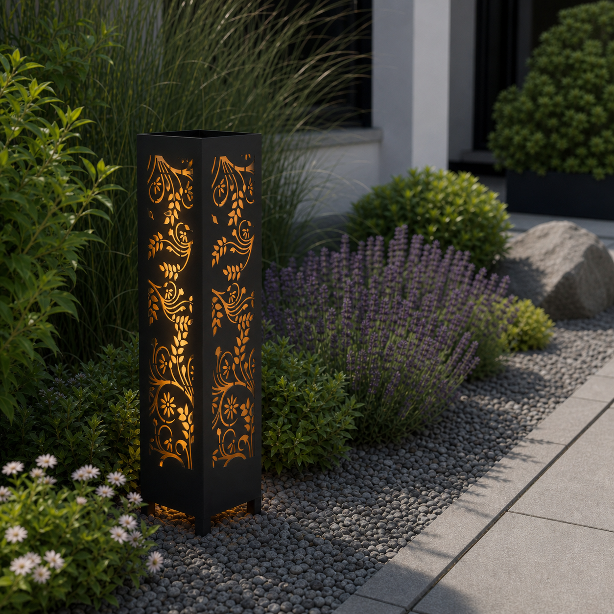 Design 110 laser cut garden light pillar installed in landscaped patio during daytime