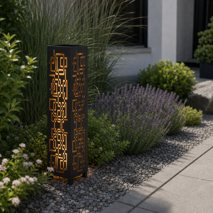 Design 114 laser cut garden light pillar installed in landscaped patio during daytime