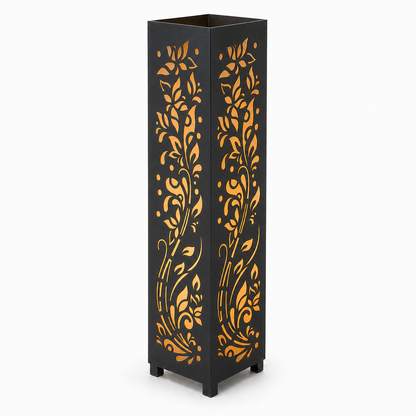 Design 116 black laser cut metal garden light tower with warm LED glow on white background