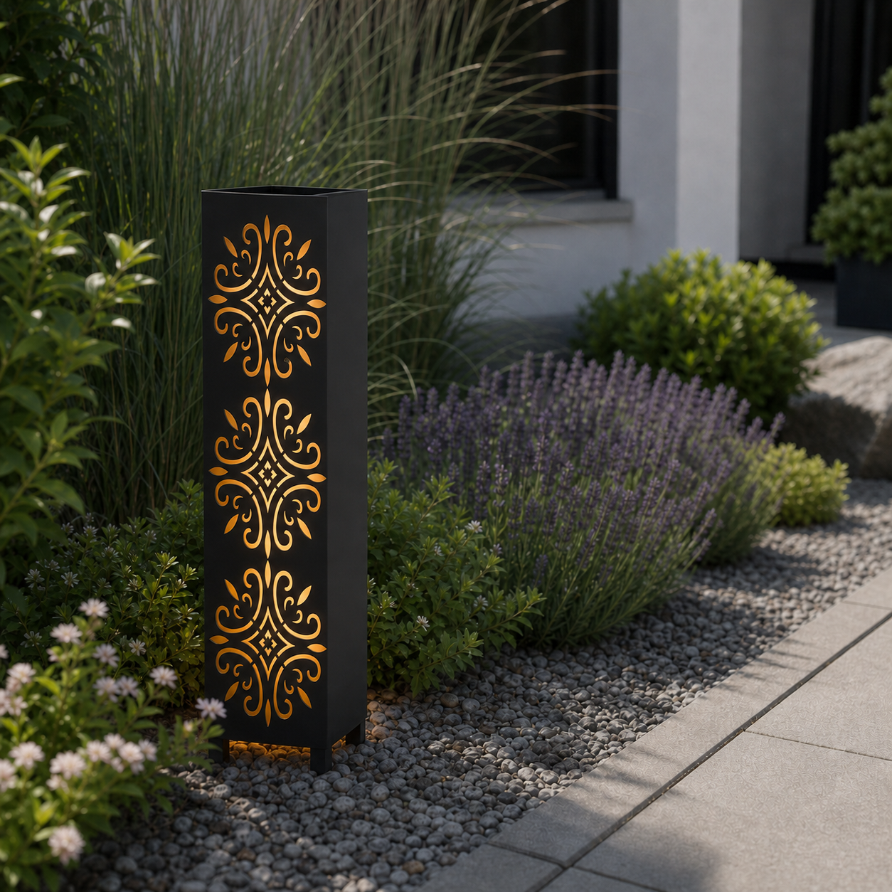 Design 122 laser cut garden light pillar installed in landscaped patio during daytime