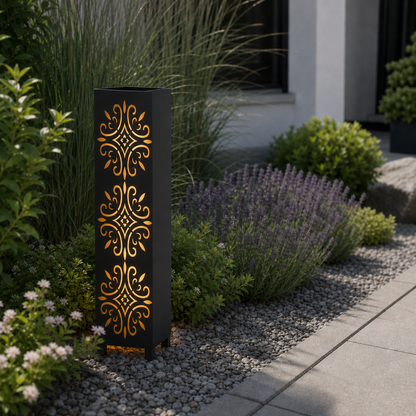 Design 122 laser cut garden light pillar installed in landscaped patio during daytime