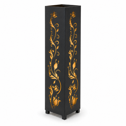Design 123 black laser cut metal garden light tower with warm LED glow on white background