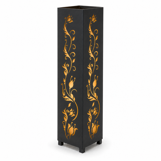 Design 123 black laser cut metal garden light tower with warm LED glow on white background